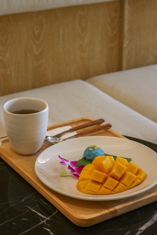 Mango with sticky rice served after a massage